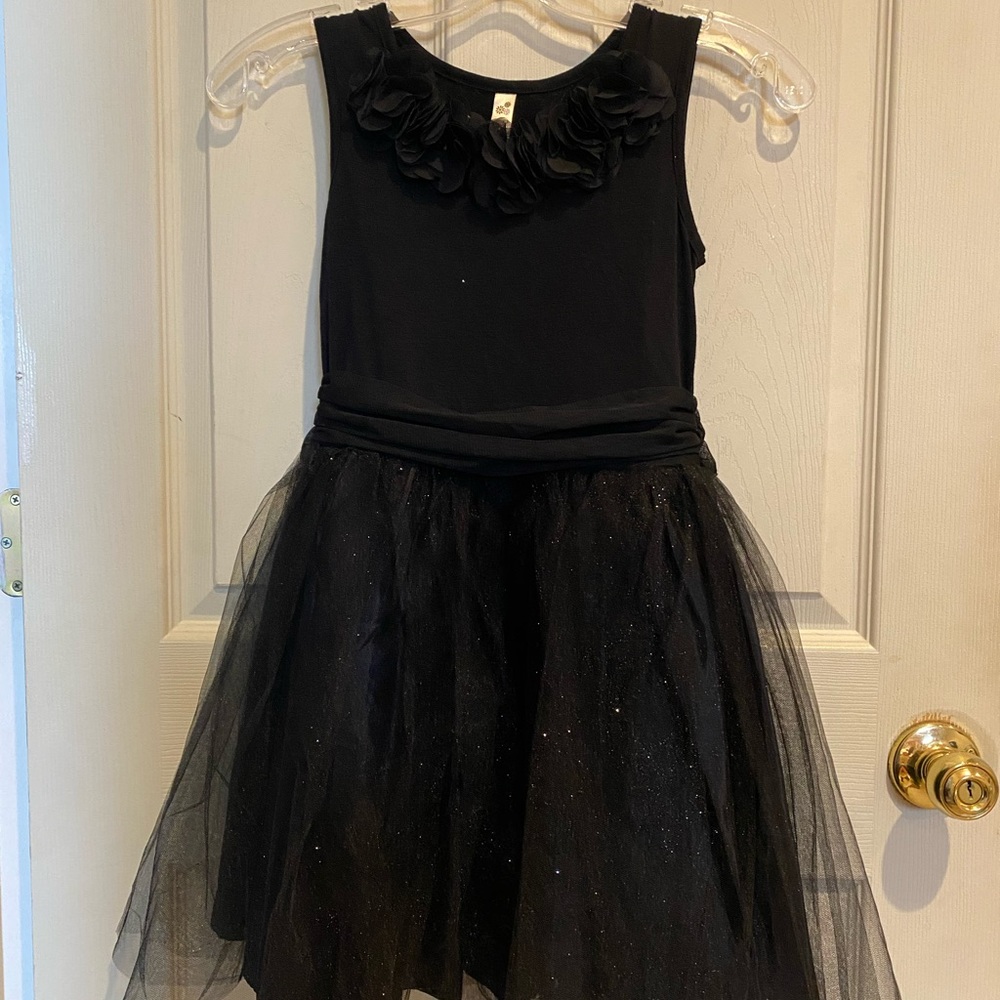 Girls black dress with glitter overlay